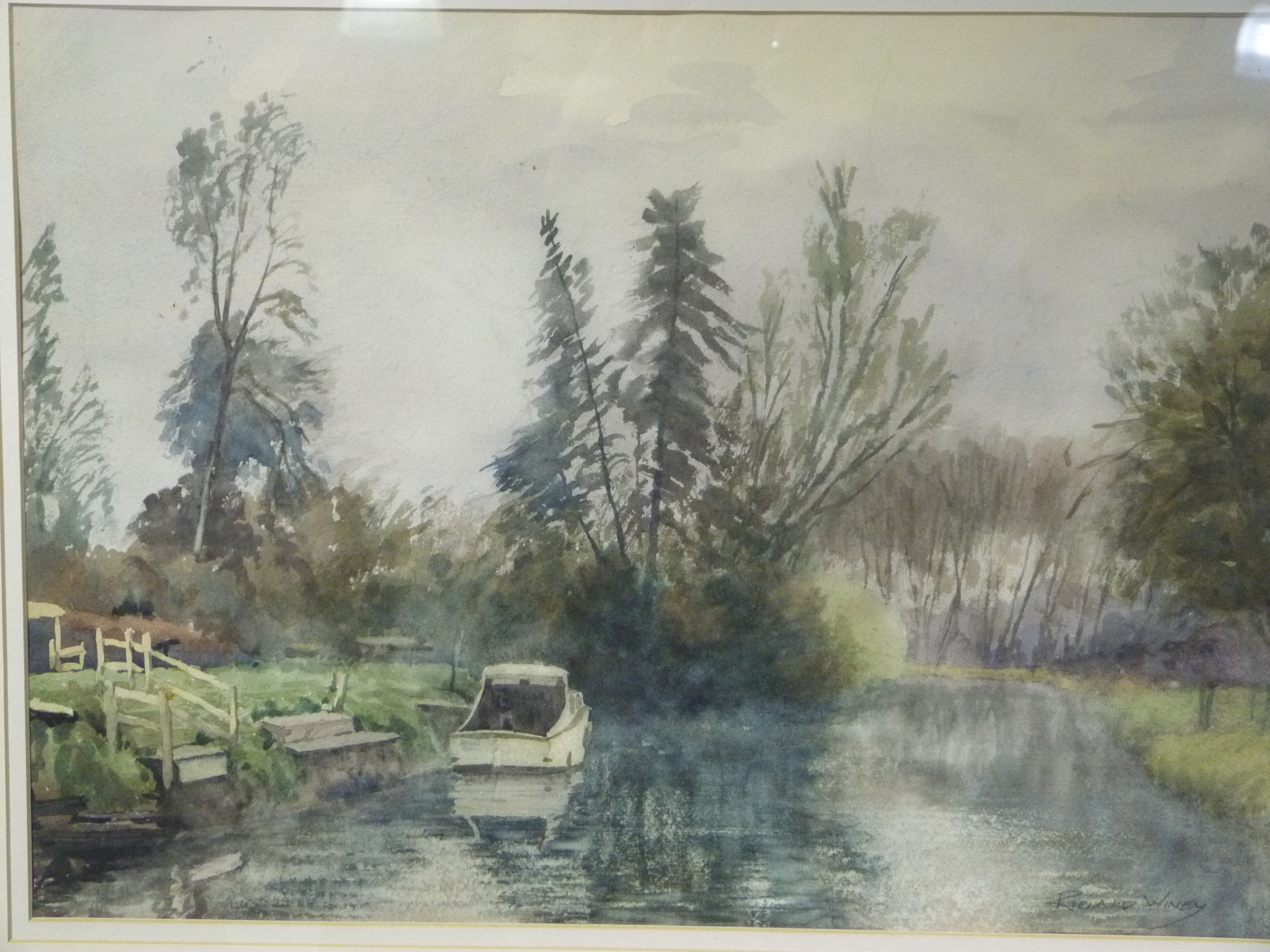 Richard Winey river landscape with moored motor boat, watercolour, signed to lower right, 34.5cm x - Image 2 of 2