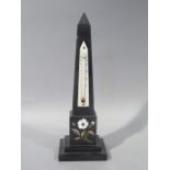 An Ashford black slate obelisk thermometer, ivory register above a pillar inlaid with a white rose