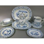 A collection of blue and white including, a pair of graduated meat plates, plate stands, bowl,