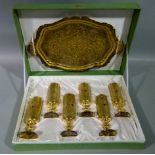 A Venetian gilt wood shaped oval two handled tray; together with a set of six gilt cylindrical