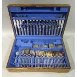 A canteen of Mappin and Webb silver plated table cutlery, contained within a blue felt lined oak box