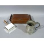 An Art Deco mahogany cigar box, a pewter mug and a handled ash tray with hinged lid (3)
