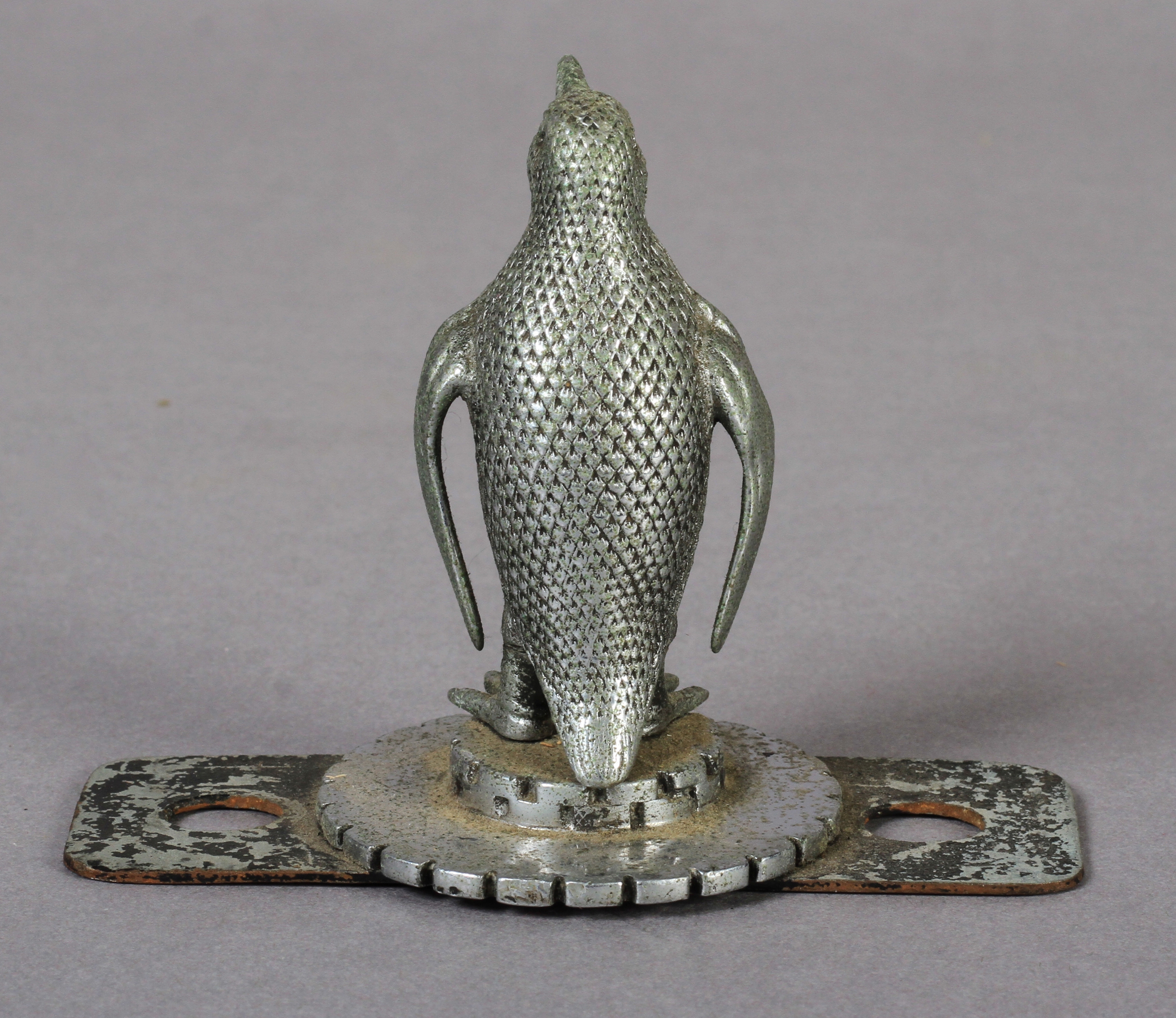 A Penguin car mascot, chrome, on circular notched base, 7cm high, c.1920/1930 - Image 2 of 2