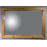 A pine framed rectangular wall mirror, 103cm x 72cm