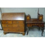 A mahogany bureau having a fall front fitted interior, over two short and two long drawers with