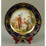 A Vienna porcelain cabinet plate painted to the centre in the manner of Anjelica Kauffmann with '