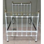 A Victorian brass and white painted iron single bedstead with knob finials