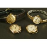 Four ladies' wristwatches all in 9ct gold cases by makes including Tissot and Rotary, all with
