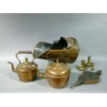 Two copper kettles, pair of brass chamber sticks, pair of bellows and a copper coal helmet