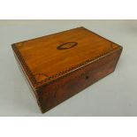 A George III tortoiseshell and satinwood veneered workbox, the hinged lid with shaded shell oval