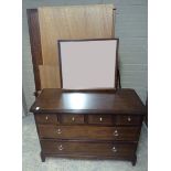 A Stag Minstrel two door wardrobe and dressing chest with mirror (the wardobe requires reassembling)