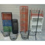 A quantity of metal mesh shelving, including one set numbered 1, 2, 3, another set in red with a