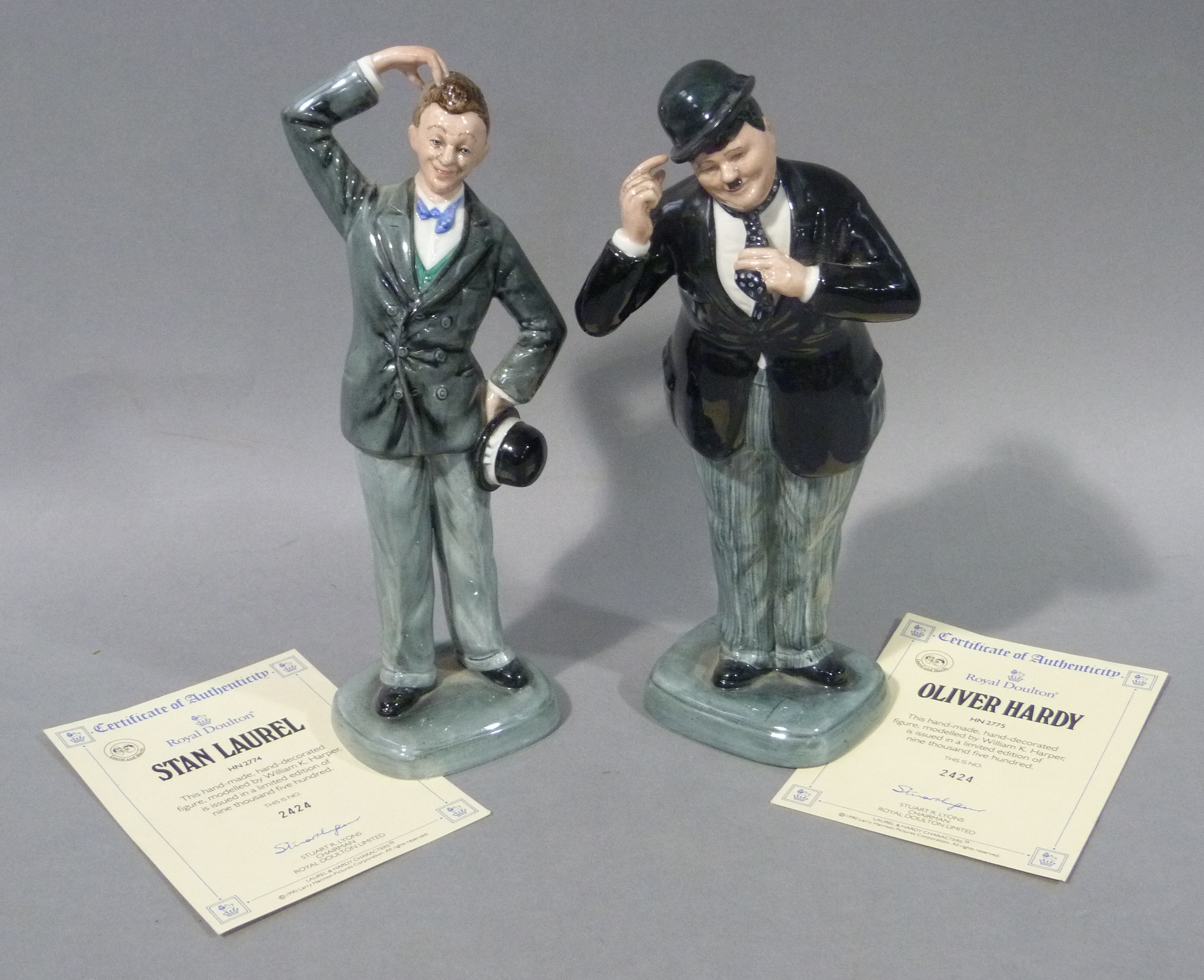 A Royal Doulton limited edition figure of Stan Laurel, number 2424, 24cm high, printed mark in