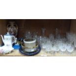 Part suite of cut glass including flutes, brandies, wines, fruit dishes, water jugs, decanter and an