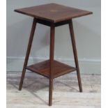 An Edwardian mahogany and satinwood banded occasional table of square outline having a satin and