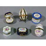 Six Limoges style porcelain pill boxes, one circular drum shaped, two egg, a hexagonal example, a