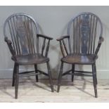 A pair of Windsor armchairs on turned legs
