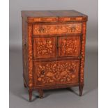 A 19th century Dutch walnut and satinwood marquetry dressing table, all over inlaid with urns of