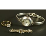 A single stone ring in 9ct gold claw set with a fancy brilliant cut cubic zirconia, together with