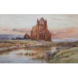 J W WILLIAMS (fl 1900-1920) The Abbey, Whitby, with cattle watering, the town and abbey beyond,