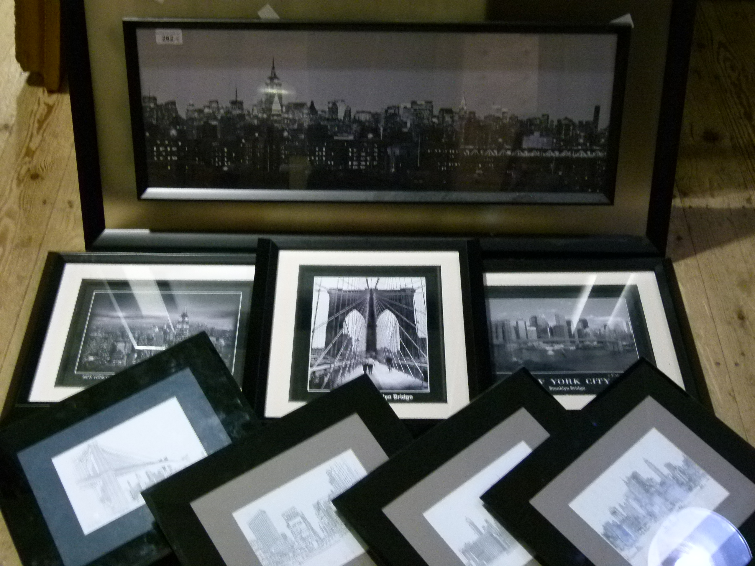 Eight framed pictures of New York skyline