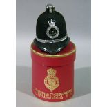 A Christy's miniature West Yorkshire police helmet contained in a red card box with gilt decoration,