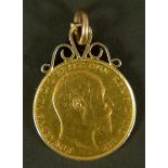 An Edward VII sovereign 1909 with later attached scroll top pendant loop, approximate weight 8gm