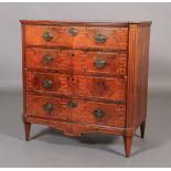 A 19th century Dutch walnut and satinwood chest of four graduated drawers, the top inlaid with a