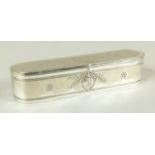 A WMF Alpaca curling tong box with fitted heater, the oval box with hinged lid embossed floral