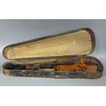A violin, made in Nippon, in wooden case with bow