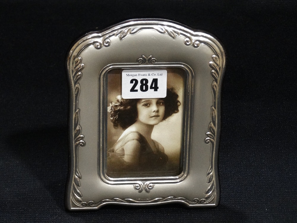 A Contemporary Victorian Style Silver Bordered Photograph Frame