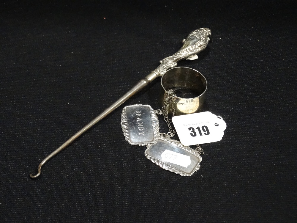 A Silver Serviette Ring, Together With Two Decanter Labels & A Button Hook