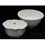 Two White Pottery Blancmange Moulds