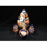 Three Imari Decorated Lidded Vases & A Narrow Necked Bottle (4)