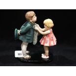 A 1930s Goldscheider Group Of A Boy & Girl By Germaine Bouret, Printed Mark, 10" High