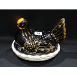 A Staffordshire Pottery Black Lustre Hen On Nest, 8" Across