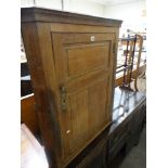 An Antique Oak Single Door Hanging Corner Cupboard