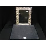 A Victorian Style Silver Bordered Photograph Frame To Take 9" X 7" Image Size