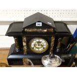 A Victorian Black Marble Encased Mantel Clock With Circular Dial