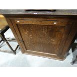 An Antique Oak Single Door Hanging Corner Cupboard