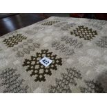 A Cream Ground Welsh Woolen Bed Cover