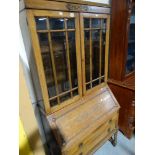 An Early 20th Century Polished Oak Bureau Bookcase