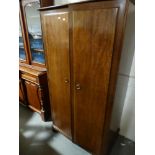 A Mahogany Finish Stag Two Door Wardrobe