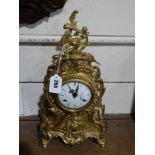 A Gilded Brass Italian Reproduction Of A Roccoco Mantel Clock