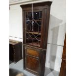 A 19th Century Oak & Mahogany Two Piece Standing Corner Cupboard