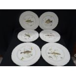 A Set Of Six Ironstone Circular Plates With Fish Decorated Centre Panels