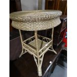 A Circular Topped Two Tier Loom Occasional Table