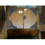 An Edwardian Oak Stationery Cabinet