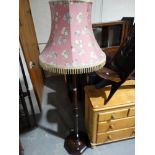An Early 20th Century Polished Oak Standard Lamp