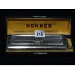 A Hohner 64 Chromonica In Original Box